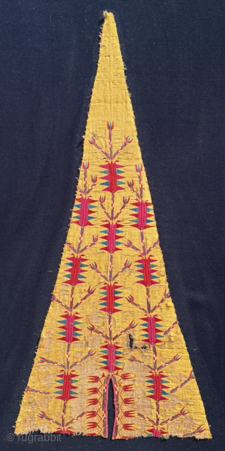 Early Turkmen chyrpy side panel, 83 x 40 cm, mounted on heavy black cotton. Email: peparethos@xsmail.com