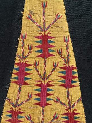 Early Turkmen chyrpy side panel, 83 x 40 cm, mounted on heavy black cotton. Email: peparethos@xsmail.com