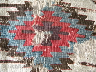 Anatolian kilim fragment with considerable age, probably early 19th century, as mounted, 179 x 166cm; the fragment itself: 156 x 140cm.            
