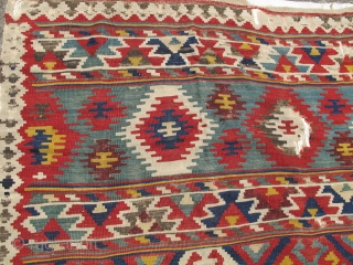 Shirvan Kilim, good age, colorful and graphic with a particularly good use of white.

This piece is lightly mounted and conserved against a white cloth.
size is 5'10"x8'0"       