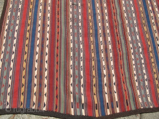 Northwest Persian Jajim with floating weft work and a rainbow of colors. size : 5'7"x6'9".                  