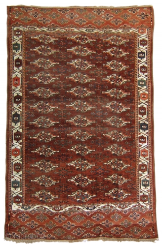 This fine Yomut main carpet is drawn with fantastic scale. Large chuval guls dominate the field while leaving appropriate spacing for the chemche minors. The columns of ornament are fluid as gul  ...