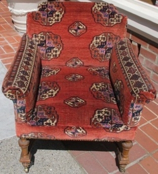 Chair upholstered with fragments from a Salor main carpet. Some of the inner portions are contiguous. The chair is probably late 19th century. The fragments are certainly earlier and were antique when  ...