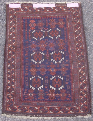 Baluch poshti. Probably from Khorossan, 4th quarter of the 19th century. Excellent condition with only slight corrosion to the brown. All natural dyes. This small rug was probably once the pile face  ...