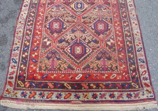 Northwest Persian Kurdish long rug with classic geometricized floral design. Very colorful and without fading, though there is a bit of fuchsine. circa 1900. A great useable floor rug. Later but still  ...