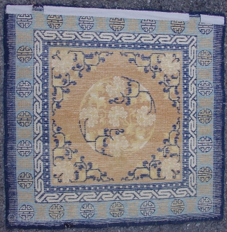 Chinese Ning Hsia Square with a floral roundel. Great border system. 3rd quarter of the 19th cen. Size = 2'7" x 2'8". Inv# 14815.         