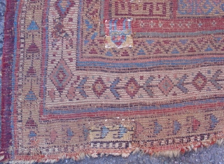 Kurd Rug, probably from Khorosan. Great wool and color with a regional adaptation of some familiar Kurdish drawing. Second Half of the 19th century (probably 3rd quarter). This piece has been cut  ...