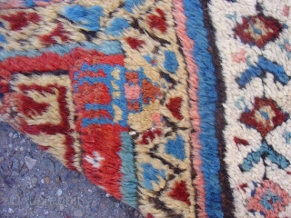 Kurd Rug, probably from Khorosan. Great wool and color with a regional adaptation of some familiar Kurdish drawing. Second Half of the 19th century (probably 3rd quarter). This piece has been cut  ...