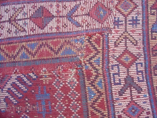 Kurd Rug, probably from Khorosan. Great wool and color with a regional adaptation of some familiar Kurdish drawing. Second Half of the 19th century (probably 3rd quarter). This piece has been cut  ...
