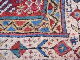 Kurd Rug, probably from Khorosan. Great wool and color with a regional adaptation of some familiar Kurdish drawing. Second Half of the 19th century (probably 3rd quarter). This piece has been cut  ...