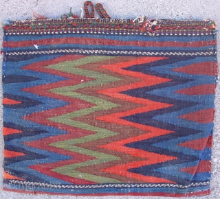 Flatwoven Afshar bag. Sharp natural colors. Very graphic with a zig-zag kilim back. circa 1880. Size = 1'3" x 1'6". Inv. # 14863.          