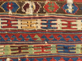 Uncommon, small-format kilim from west Anatolia. Possibly Kutahya area. Displays some features found on Yuncu heybes. The quality of the dyes indicate good age, pre-1850, in my opinion. A happy piece with  ...