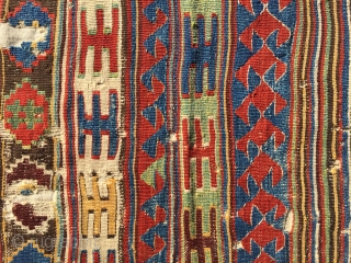 Uncommon, small-format kilim from west Anatolia. Possibly Kutahya area. Displays some features found on Yuncu heybes. The quality of the dyes indicate good age, pre-1850, in my opinion. A happy piece with  ...