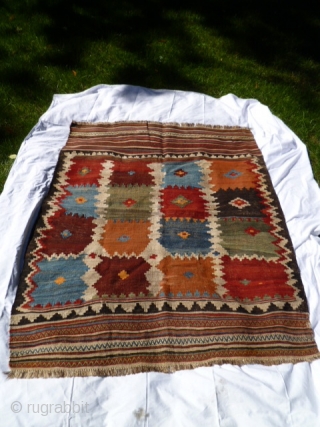 Late 19th, early 20th century gabbeh-like small kilim.  SW Persian, probably Luri, given warps. Collected 20 years ago and has been in a camphorwood lined chest ever since!  Size is  ...