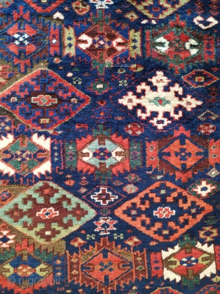 Kurdish rug of unknown origin. I would be happy to hear views. It has some obvious Sauj Bulagh design elements but otherwise is not typical. A beautiful wonky tribal piece with heavy  ...
