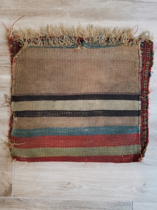 Interesting Kurdish bag from north west Persia. Note the flatweave back is not connected at the sides and there is a little damage to one corner.
52 x 54 cm    