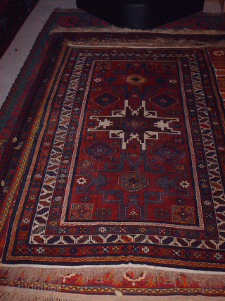 Name:  ZEIWA - Kuba (Lezgi Star)

Category:Caucasian

Origin: Azerbaijan

Age:1950th

Description: Azerbaijan Zeiwa Kuba Rug 

Dimension: 125 x 220 cm 

Composition: 100% Wool Base and Pile

Condition: Excellent         