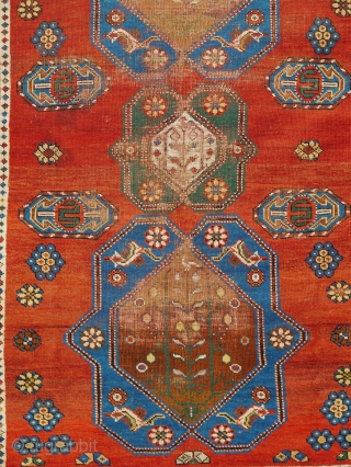 Antique Kazak 200x137cm
Material:	Wool on wool
Manufacturing period:	1850-1899
Country:	Iran
Condition:	Overall in fair condition with traces of ageing and usage and low pile 

This rare and unique handmade all-wool red-ground Caucasian Lambalo Kazak dates to the second  ...