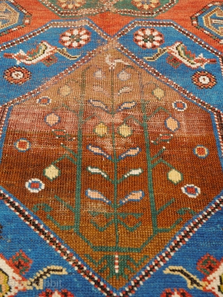 Antique Kazak 200x137cm
Material:	Wool on wool
Manufacturing period:	1850-1899
Country:	Iran
Condition:	Overall in fair condition with traces of ageing and usage and low pile 

This rare and unique handmade all-wool red-ground Caucasian Lambalo Kazak dates to the second  ...