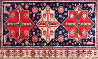 This is a second-half of the 20th century (1970s) Caucasian rug from the town of Shirvan on the shores of the Kura river in Azerbaijan 
It features a classic pattern of diamonds  ...