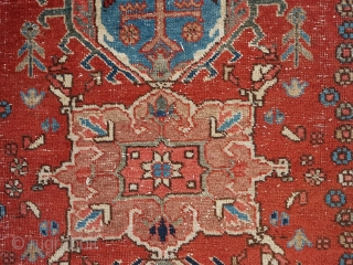 This is a 1900s Karajah 130x95 cm or 4.3x3.1 feet in overall OK condition with traces of use and age. Note some wool discoloratio around the border 

     