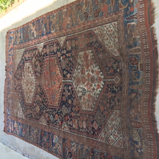 1880's QASHQAI 6x9 Rug:
Also known as Shiraz rug, this Qashqai Rug is a definite treasure. 
This wool rug hand made in Iran is 6x9, very thin, all over wear, all over pattern,  ...