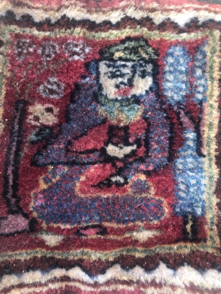 one of the smallest bagface (Tashe) Farahan (Persian),19x19 cm,full pile;about 80-90 years old,it shows a Darwish,back is with a velvet             