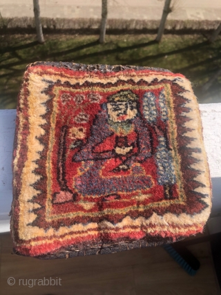 one of the smallest bagface (Tashe) Farahan (Persian),19x19 cm,full pile;about 80-90 years old,it shows a Darwish,back is with a velvet             
