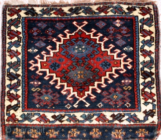 A 2'11"x2'5" Antique South West Persian bagface.Featuring a thick lusterous pile,and a beautiful midnight blue field,with an extra panel along the bottom. This bagface is in full thick pile with some minor  ...