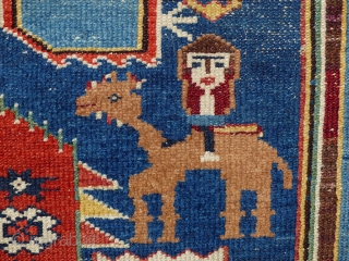 A nomadica Bakhtiari Rug,circa 1900 jh,Beautiful Colours,animals,flowers and other tribal motife.
midfield has low pile,original ends and sides,no repair.
size; 205x123 cm             