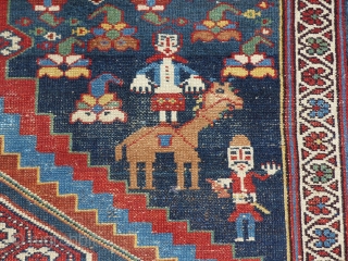 A nomadica Bakhtiari Rug,circa 1900 jh,Beautiful Colours,animals,flowers and other tribal motife.
midfield has low pile,original ends and sides,no repair.
size; 205x123 cm             
