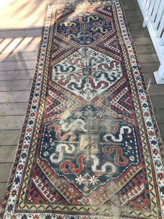 Cloudband caucasian rug 104’ X 43” worn, the field filled with diagonal latch hooks                   