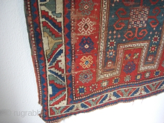 An antique Kazak prayer rug with the size 162 X 105 cm. Open sides, used parts. No repairs, no tinting, no cut. Good colors.         