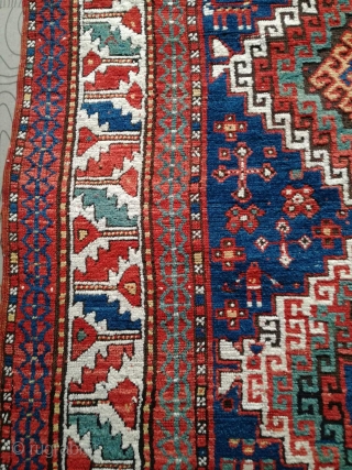 An antique Kazak rug. All natural dyes. 220/134 cm. Signs of use but good shape. All endings original. No repairs.             