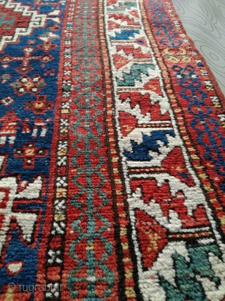 An antique Kazak rug. All natural dyes. 220/134 cm. Signs of use but good shape. All endings original. No repairs.             