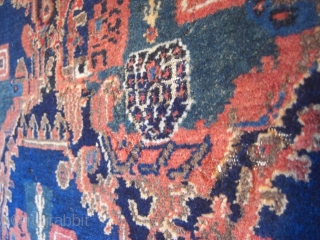 An old Senneh rug. Good shape but moth demages. 144 X 100 cm.                    