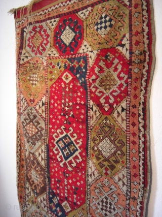 An antique Anatolian village rug. 156 X 98 cm. Good shape with no repairs, no cuts, all original sides with kilim endings.           