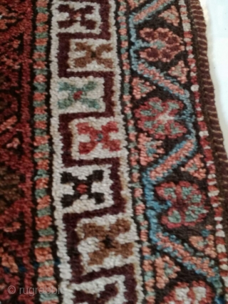 An antique camel hair ground NW Persian runner with 430/108 cm in good condition. Two spots repiled. One side with kilim ending, the other open. On wool rug.     