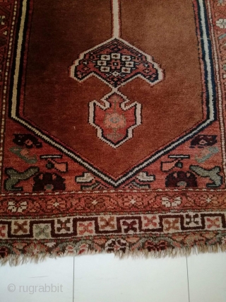 An antique camel hair ground NW Persian runner with 430/108 cm in good condition. Two spots repiled. One side with kilim ending, the other open. On wool rug.     