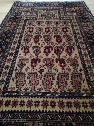 An old Baluch prayer rug in very good shape. 130/80 cm.                      