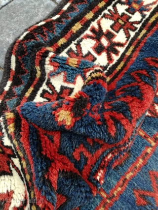 Old Kazak or Karabagh rug with 243/134 cm. Perfect condition with full pile.                    