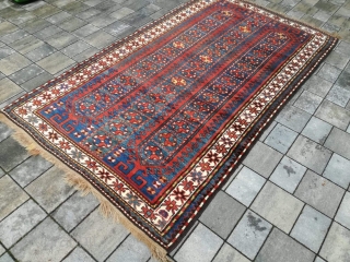 Old Kazak or Karabagh rug with 243/134 cm. Perfect condition with full pile.                    