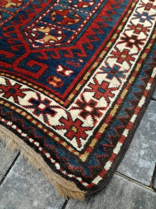 Old Kazak or Karabagh rug with 243/134 cm. Perfect condition with full pile.                    