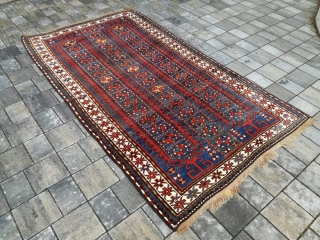 Old Kazak or Karabagh rug with 243/134 cm. Perfect condition with full pile.                    