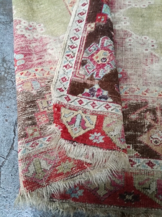 An 1870 Anatolian rug fragment with 160/110 cm.                         