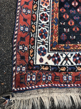 An old Gashgai rug in good shape. 240/150 cm.                        