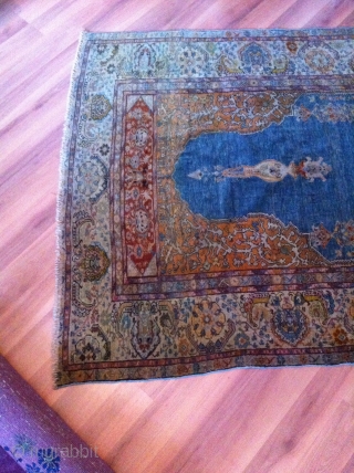An old turkish or probably North persian prayer rug with the size 155/125 cm. Good shape with reduced endings. Part silk frings.           