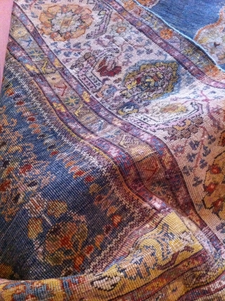 An old turkish or probably North persian prayer rug with the size 155/125 cm. Good shape with reduced endings. Part silk frings.           