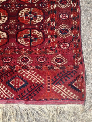 An antique Tekke rug with 140/115 cm. Good shape with some demages.                     