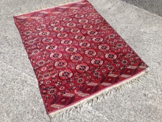 An antique Tekke rug with 140/115 cm. Good shape with some demages.                     